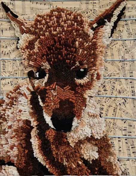 Coyote made of yarn